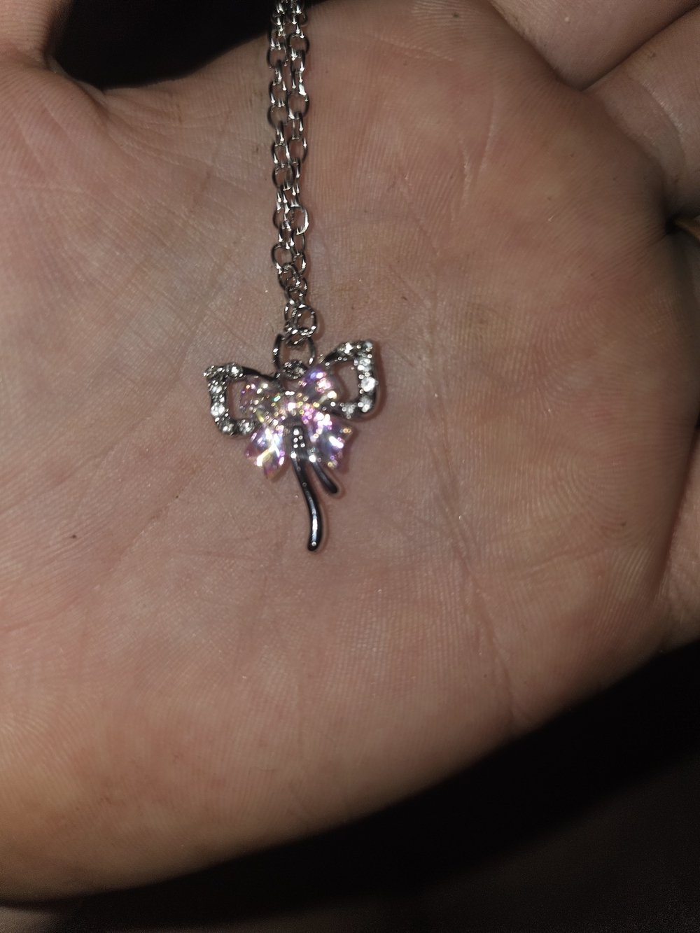 Silver Bow Pendant Necklace with Pink Crystal Accents